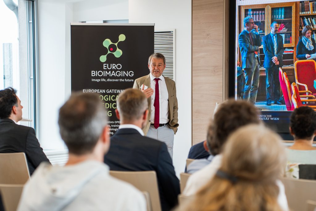Man in front of a presentation