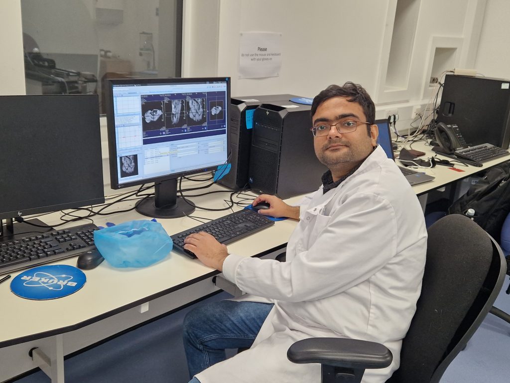 Man in front of a computer