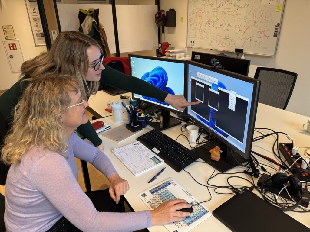 Tereza Belinova helping a colleague at the Imaging and Optics Facility, Austrian BioImaging part of EuroBioImaging