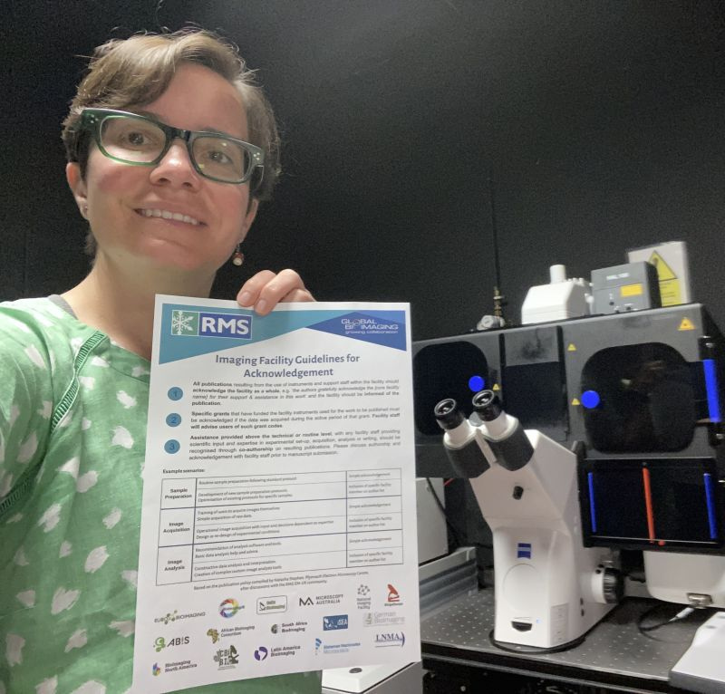 Woman in front of microscope