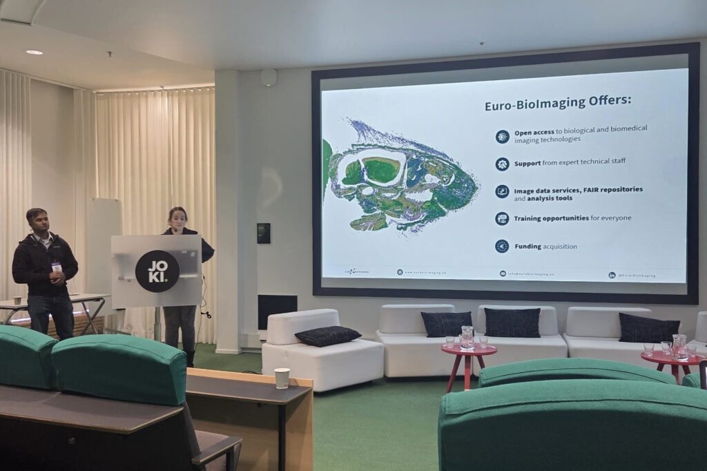 Sudeep Das and Susanne Vainio delivering a presentation on Harnessing European Data Resources & Initiatives on AI.