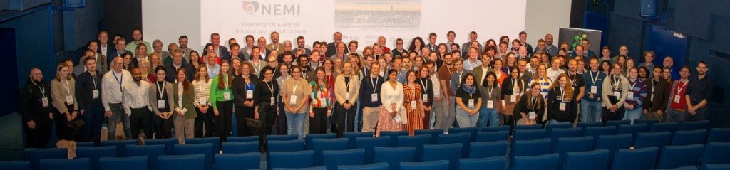 A group of people at a scientific conference.