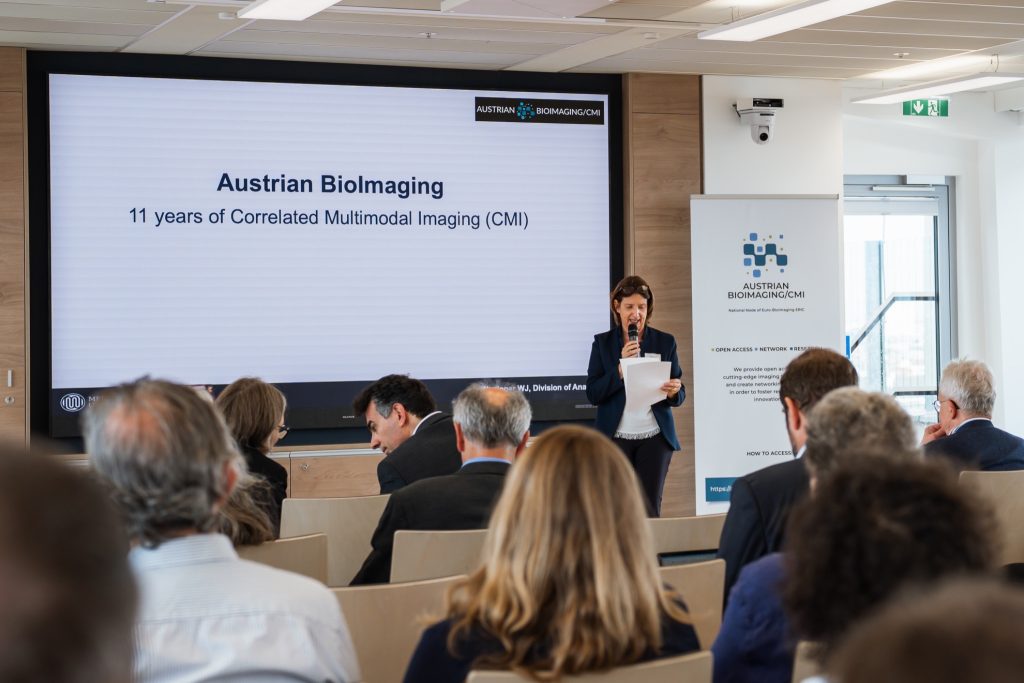 Woman in front of a presentation