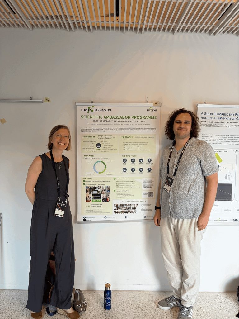 Scientific Ambassador, Bruno Stojcic, with the EVOLVE Scientific Ambassador programme poster. 