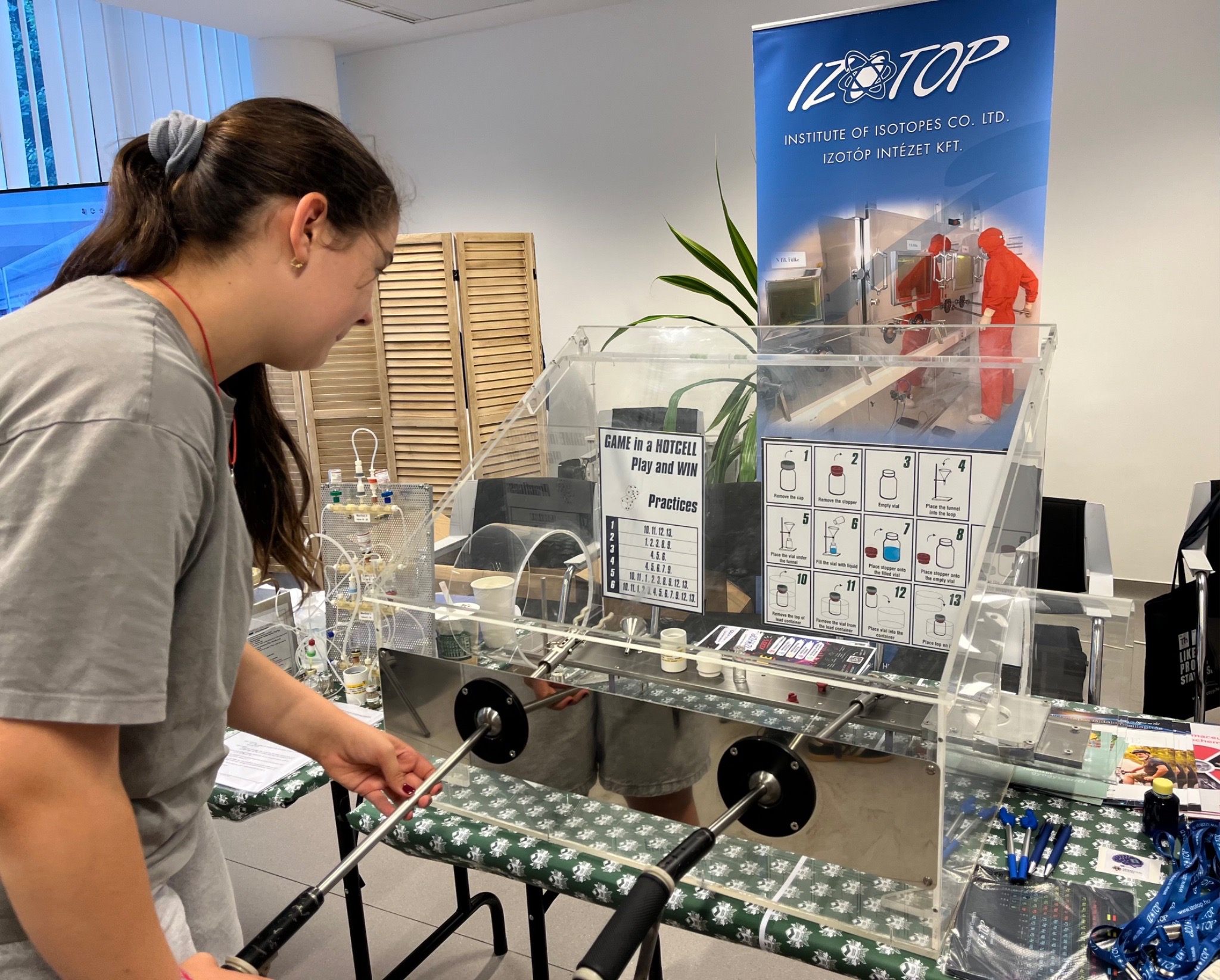 Person playing a game to illustrate scientific processes.