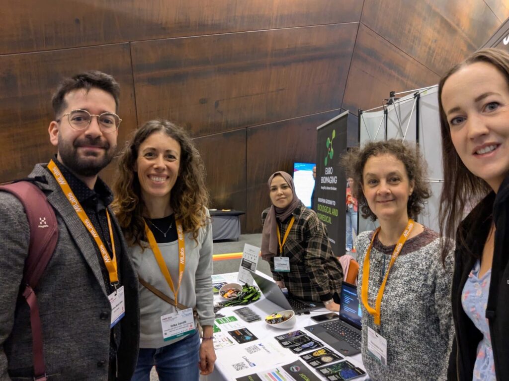 Euro-BioImaging staff at the booth with Alexandros Marios Sofias, Euro-BioImaging Scientific Ambassador