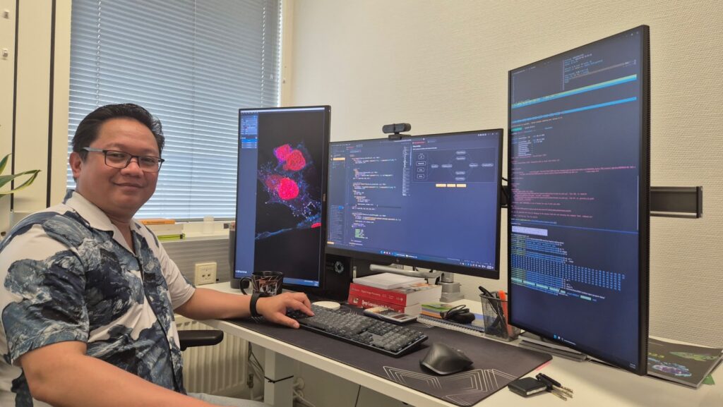 Junel Solis, Finish Advanced Microscopy Node, at work analysing microscope data.