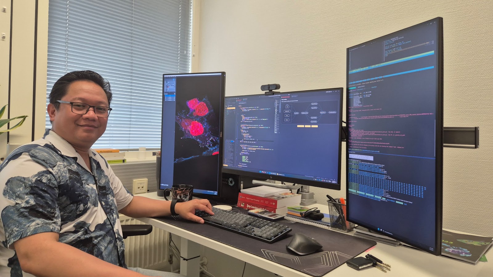Junel Solis, Finish Advanced Microscopy Node, at work analysing microscope data.